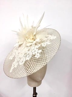 Cream sinamay/parisisal straw/ corded lace and feather saucer.